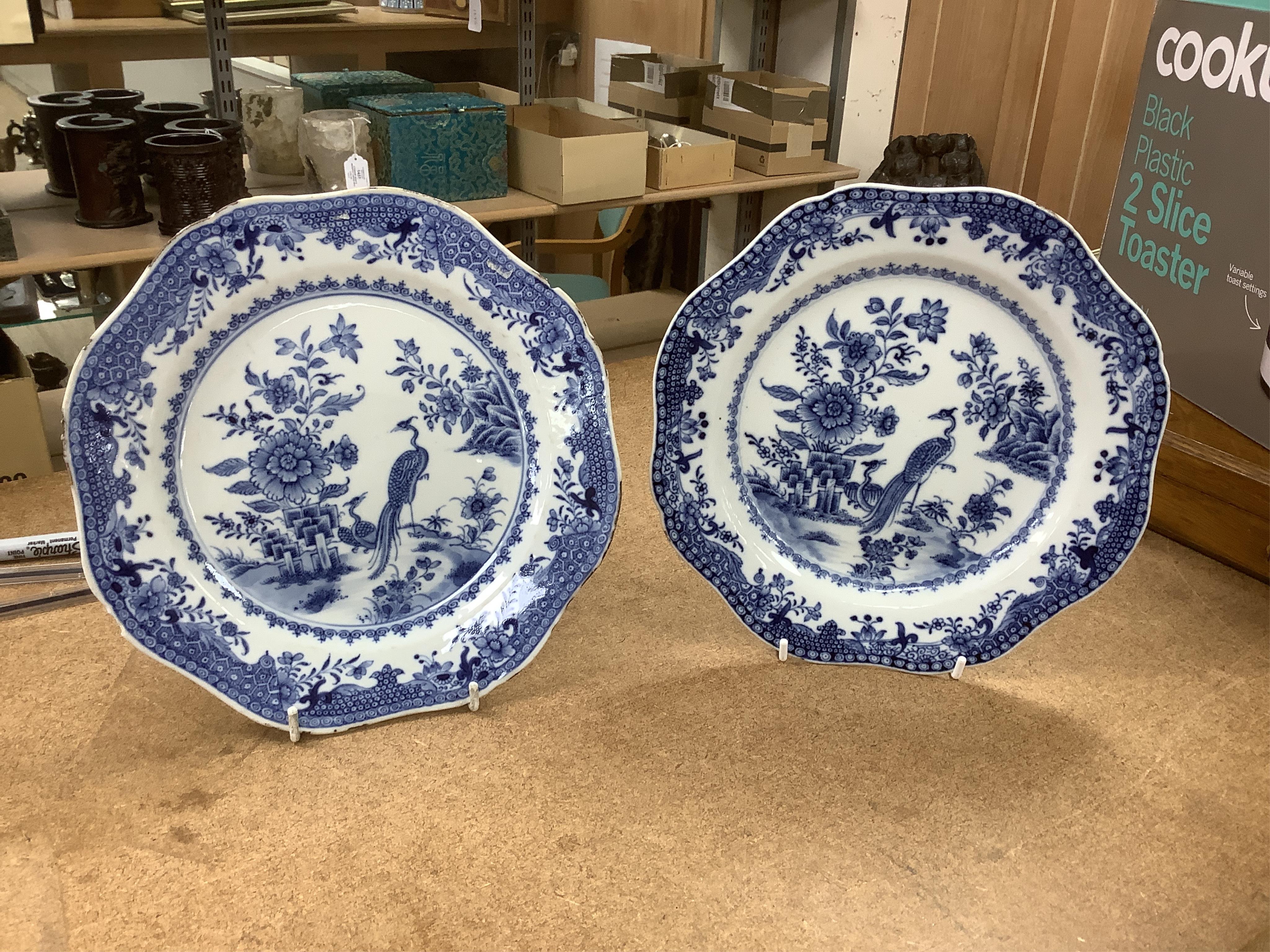 Six 18th century Chinese export blue and white plates, largest 32cm diameter. Condition - poor to fair